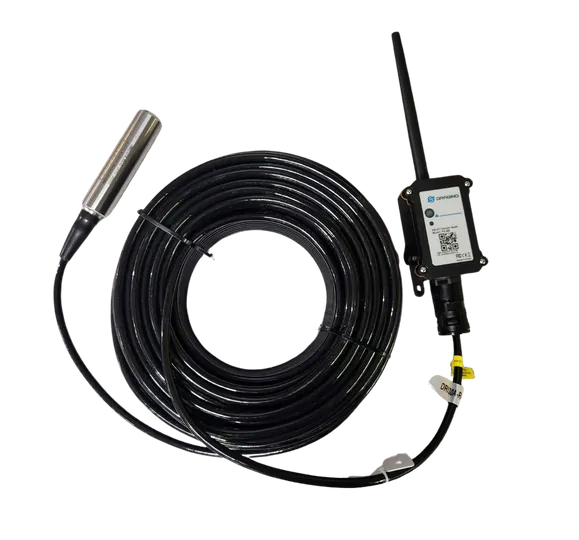 The submersible pressure sensor on a coiled black cable with the white communications unit and antenna