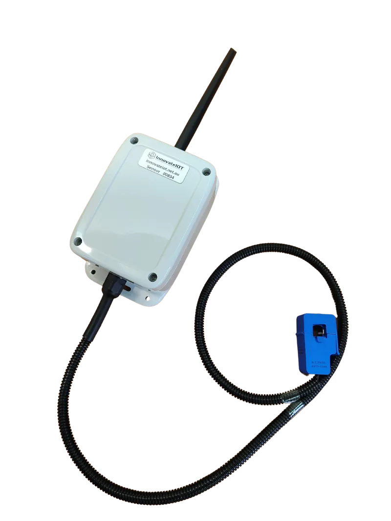 The white communications box with antenna and the cable to the gauge