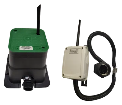 Turbine flow sensor connected by cable to the white communications box